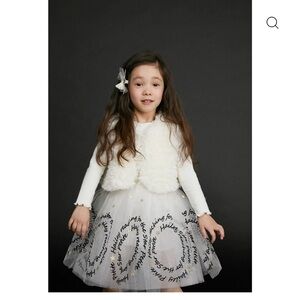 Charming White Fluffy Vest that is reversible! By Petite Hailey